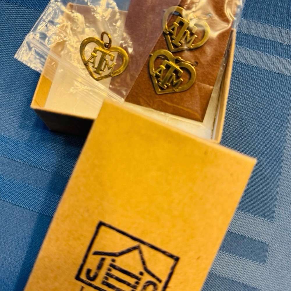 Jeep Collin’s Texas A&M collab brass pendant and earring set.  Designer, BNIB